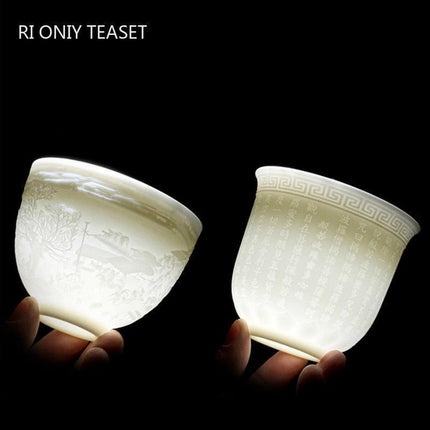 Sophisticated Handcrafted White Porcelain Tea Cup Collection with Unique 3D Relief Detail - Available in 4 Sizes