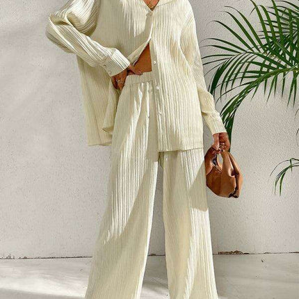 Sophisticated Pleated Blouse with Elegant Wide-Leg Trousers Ensemble for Contemporary Women - Très Elite