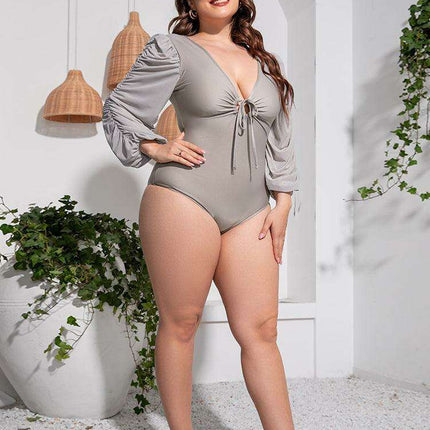 Stylish Plus Size One-Piece Swimsuit with Plunge Neckline and Balloon Sleeves - Très Elite