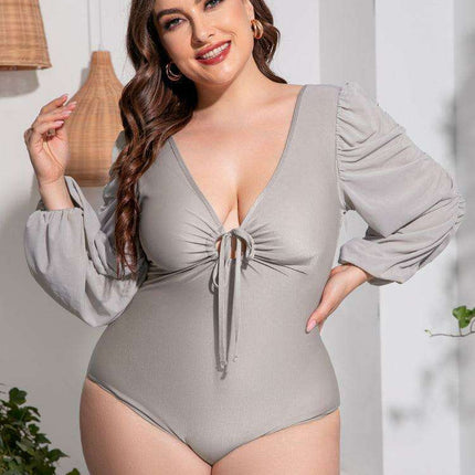 Stylish Plus Size One-Piece Swimsuit with Plunge Neckline and Balloon Sleeves - Très Elite