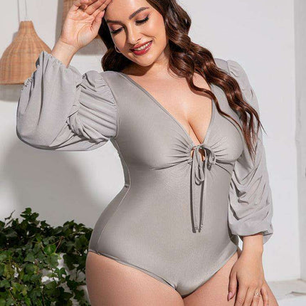 Stylish Plus Size One-Piece Swimsuit with Plunge Neckline and Balloon Sleeves - Très Elite