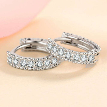 Brilliant Sterling Silver Huggie Earrings with Lab-Diamonds and Care Tips