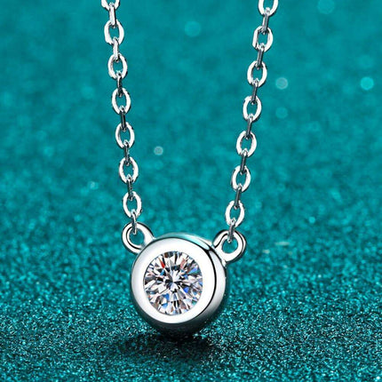 Radiant Moissanite Round Pendant Necklace Crafted in Sterling Silver