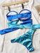 Chic Two-Tone Bikini Set with Elegant Ring Accents and Tie Detail