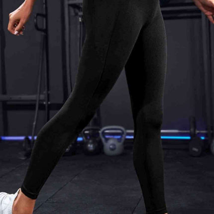 High-Waisted Active Leggings with Convenient Pockets - Durable Solid Design and Comfortable Wide Band for Fitness Enthusiasts