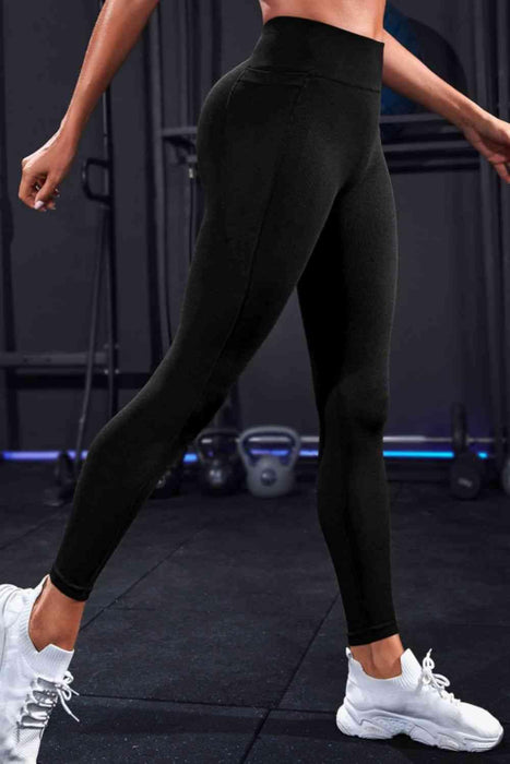 Sporty Solid Pattern High-Waisted Leggings with Pockets and Wide Waistband