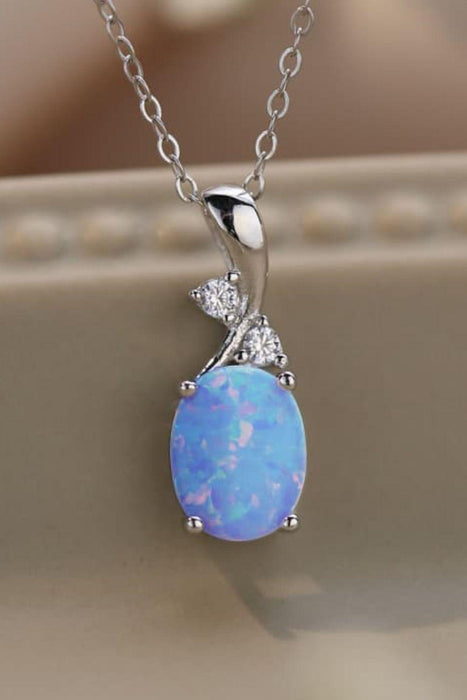 Opal Glow: Sterling Silver Pendant Necklace with Platinum-Plated Chain