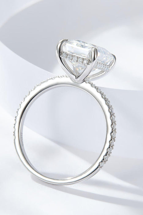 Exquisite 4 Carat Emerald Cut Moissanite Ring with Side Stones: Timeless Elegance