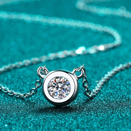 Radiant Moissanite Round Pendant Necklace Crafted in Sterling Silver