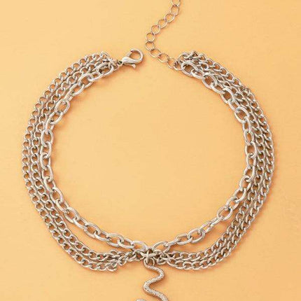 Serpent Heart Charm Triple-Layered Anklet with Elegant Tassel