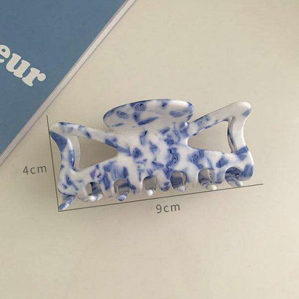 Retro Blue Floral Hairpin: Embrace Timeless Elegance in Your Style