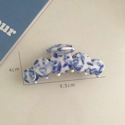 Retro Blue Floral Hairpin: Embrace Timeless Elegance in Your Style