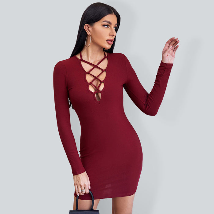 Seductive Lace-Up Mini Dress with Long Sleeves and Intricate Strap Detailing