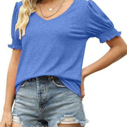 Elegant Knit Peplum Top with Statement Puff Sleeves