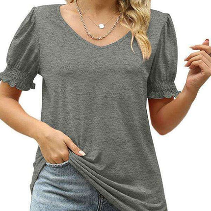 Elegant Knit Peplum Top with Statement Puff Sleeves