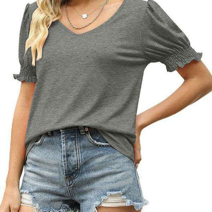 Elegant Knit Peplum Top with Statement Puff Sleeves