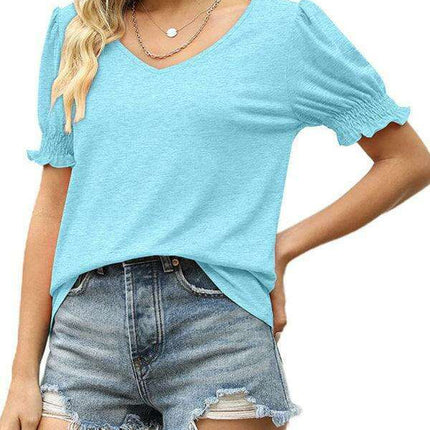 Elegant Knit Peplum Top with Statement Puff Sleeves