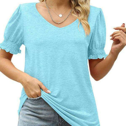 Elegant Knit Peplum Top with Statement Puff Sleeves