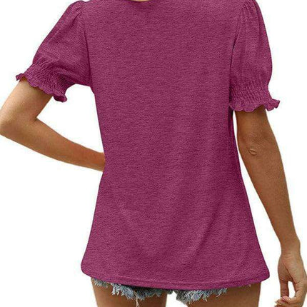 Elegant Knit Peplum Top with Statement Puff Sleeves