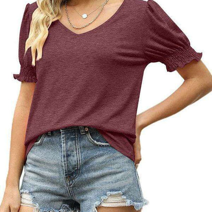 Elegant Knit Peplum Top with Statement Puff Sleeves