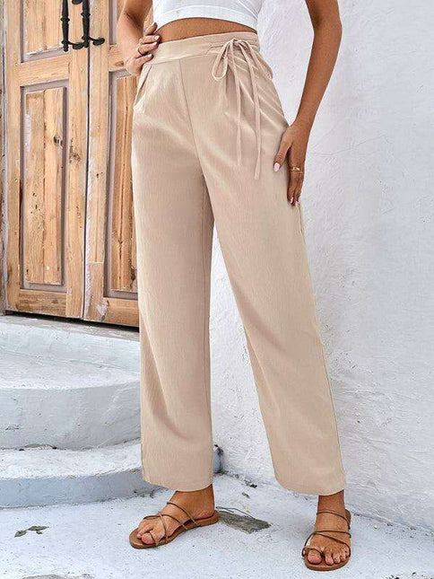 Chic High-Waisted Wide-Leg Trousers with Stylish Tie and Distinctive Print