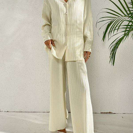 Sophisticated Pleated Blouse with Elegant Wide-Leg Trousers Ensemble for Contemporary Women