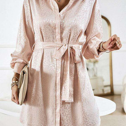 Elegant Button-Up Dress with Sophisticated Collar and Unique Self-Pattern