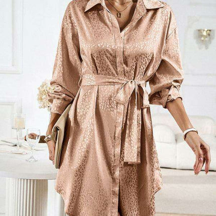 Elegant Button-Up Dress with Sophisticated Collar and Unique Self-Pattern