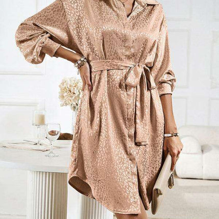 Elegant Button-Up Dress with Sophisticated Collar and Unique Self-Pattern