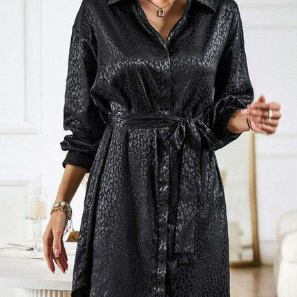 Elegant Button-Up Dress with Sophisticated Collar and Unique Self-Pattern