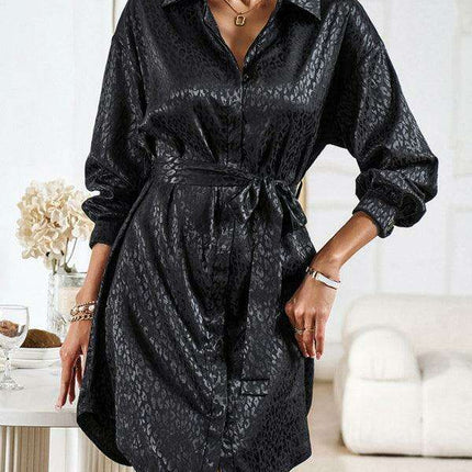 Elegant Button-Up Dress with Sophisticated Collar and Unique Self-Pattern