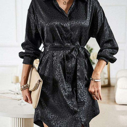 Elegant Button-Up Dress with Sophisticated Collar and Unique Self-Pattern