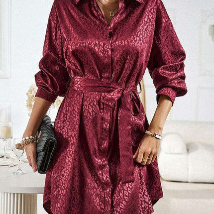 Elegant Button-Up Dress with Sophisticated Collar and Unique Self-Pattern