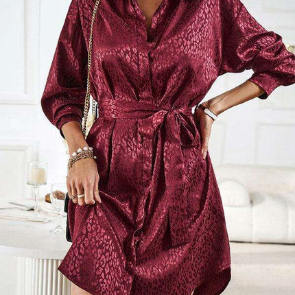 Elegant Button-Up Dress with Sophisticated Collar and Unique Self-Pattern