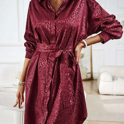 Elegant Button-Up Dress with Sophisticated Collar and Unique Self-Pattern