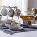 Elegant Golden Marbled Tea Set with Luxurious Gold Accents