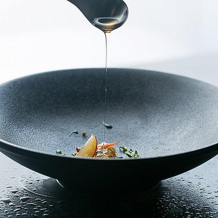 Elegant Black Ceramic Salad Bowl for Serving Fresh Greens