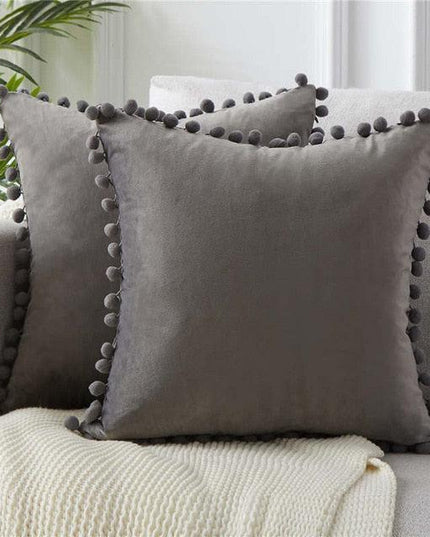 Whimsical Velvet Cushion Collection with Charming Ball Details
