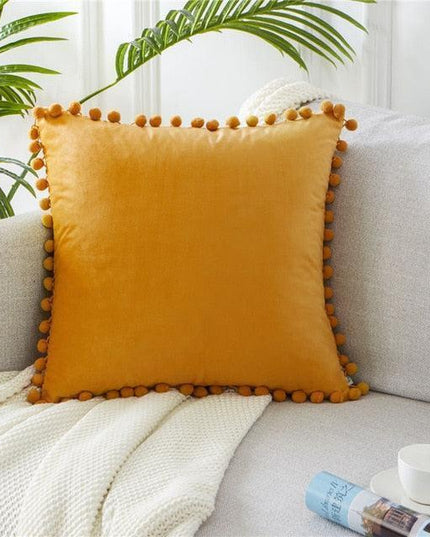Whimsical Velvet Cushion Collection with Charming Ball Details