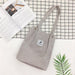 Sophisticated Canvas Crossbody Tote with Secure Closure