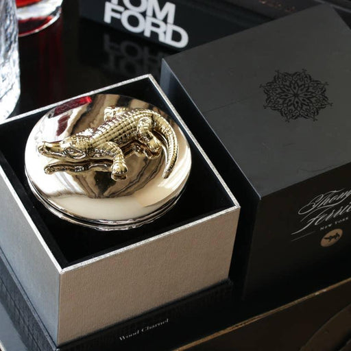 Luxurious Silver Crocodile Wood Charnel Candle with Cognac and Vanilla Notes